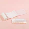 How to secure a first aid bandage tightly?